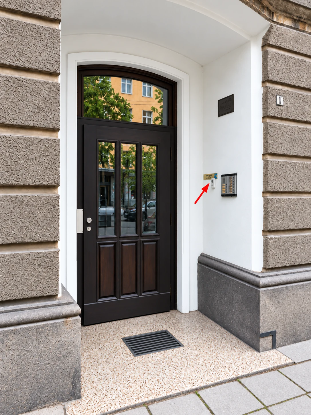 Entrance to Dr Stetson's Dental Care at 1 Krakra Street, Apartment 3, Sofia; the red arrow indicates the clinic call button
